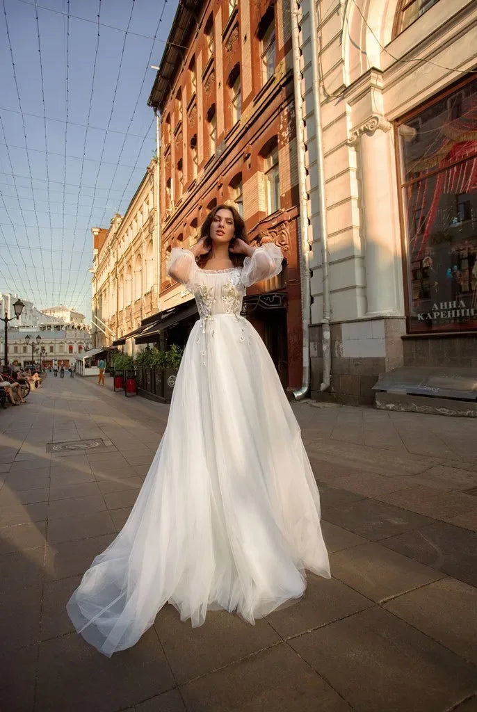 Long sleeve  off-the-shoulder sweep train A -Line wedding dress