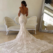 Elegant-Sweetheart-Long-Sleeves-Lace-Appliques-Backless-Mermaid-Wedding-Dress.jpg